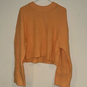 H&M cropped sweater. Worn once and in great condition! Size women’s L.